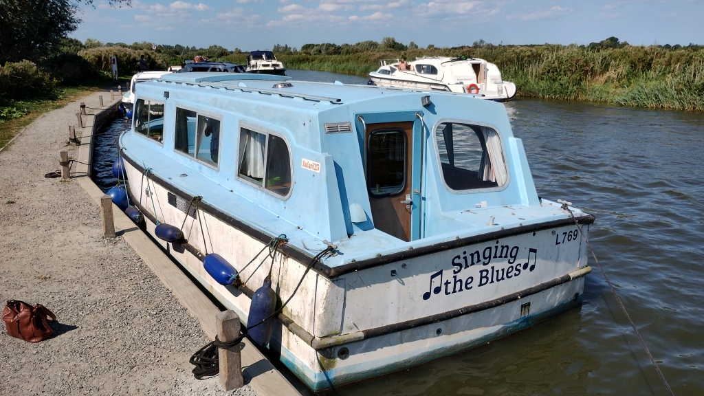 Singing the Blues moored