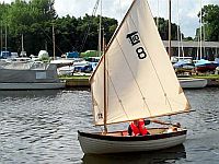 Greg Chapman sailing a
		Tideway 10